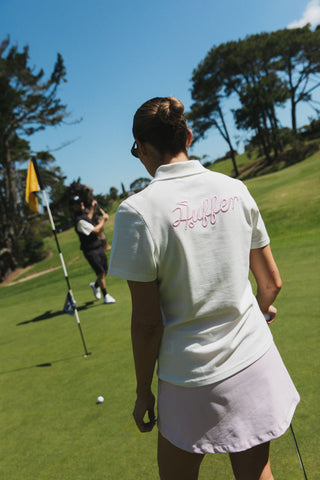 WOMENS BIRDIE SS POLO/PAR 97 CHALK/PETAL