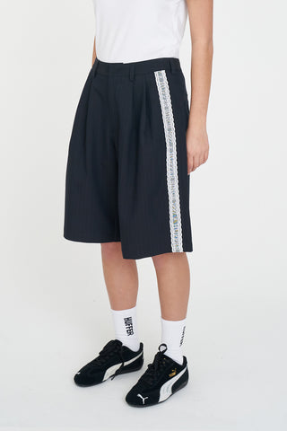 PLEATED BAGGY SHORT NAVY